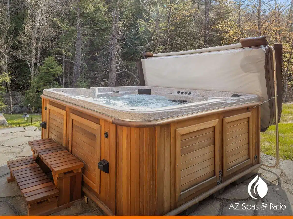 Wood-paneled outdoor Premium Collection Hot Tubs setup with steps