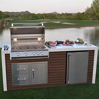KoKoMo Grill With Waterfall Edge Outdoor Kitchen